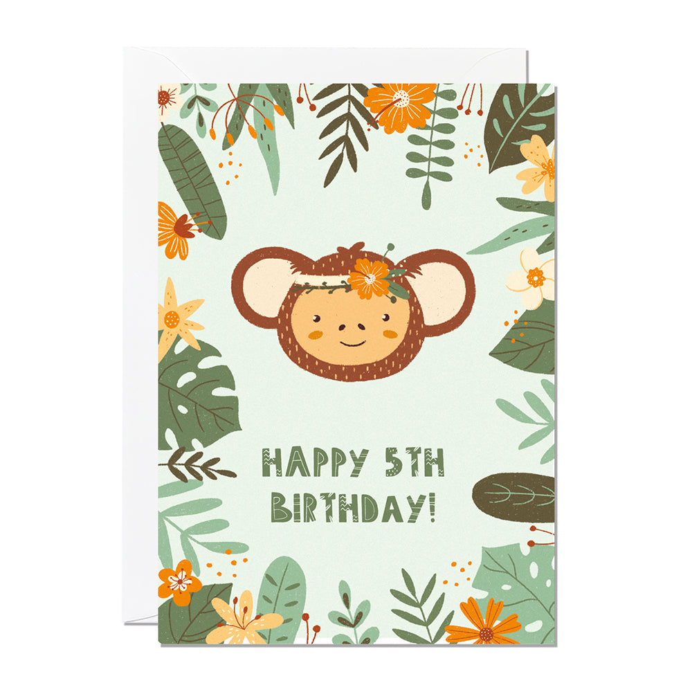 A children's 5th birthday card with the greeting 'happy 5th birthday' featuring an illustration of a monkey with jungle foliage around the border